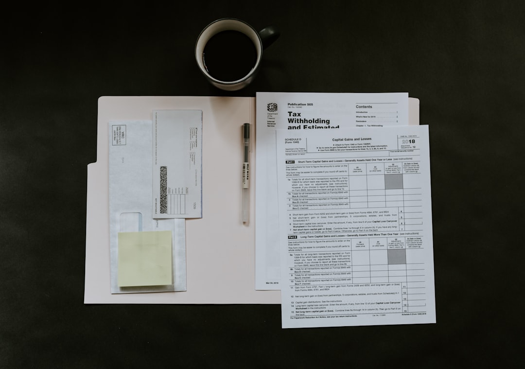 Notebook with trip plan and camera